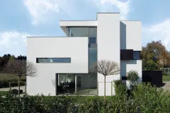 Haus mit verschachtelten geometrischen Formen