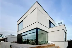 Einfamilienhaus kubistisch mit weißem Putz